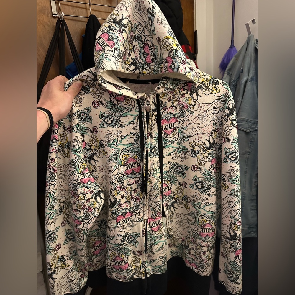 Love Hoodie with silver heart zipper and awesome designs. Zero flaw’s